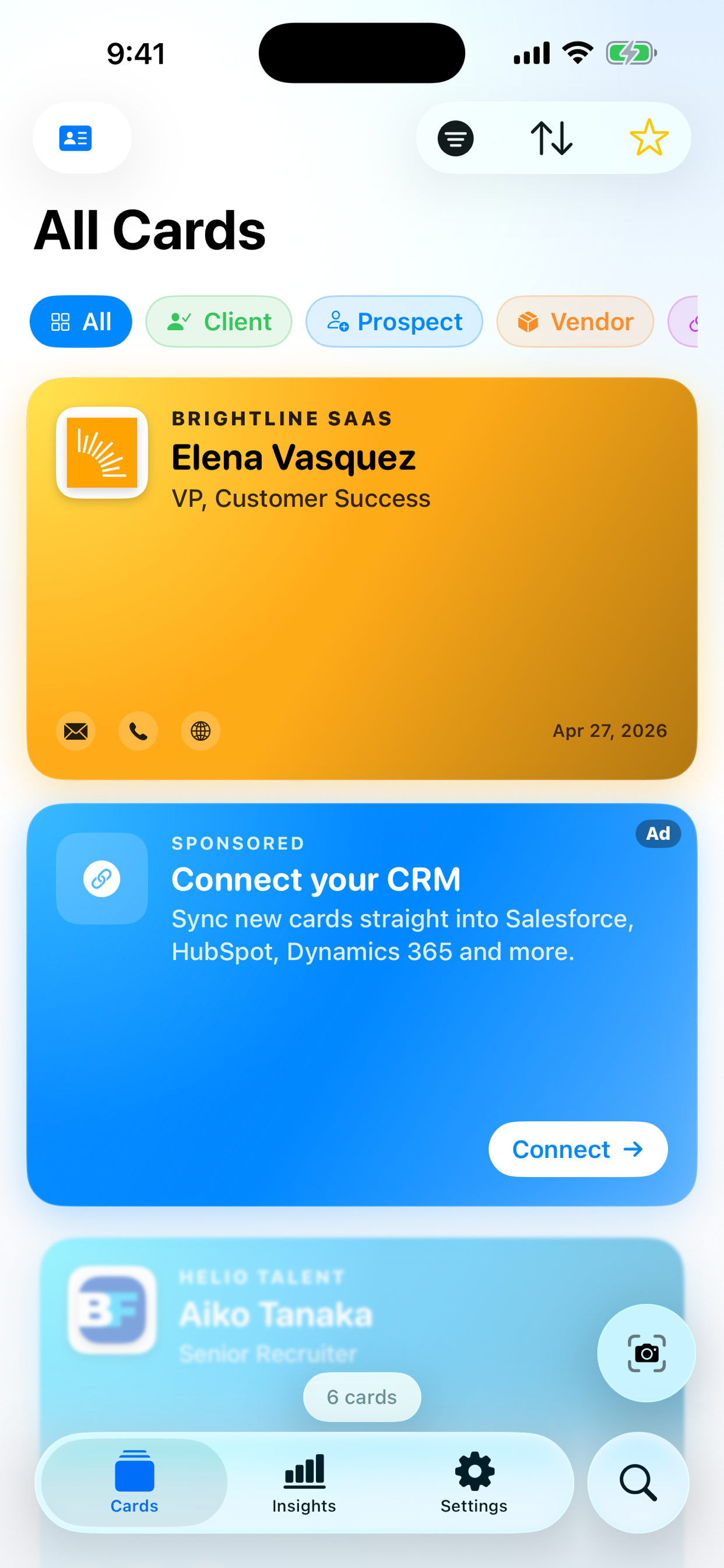 The Lead-Lens cards screen on iPhone, showing a wallet-style stack of recently scanned business cards.